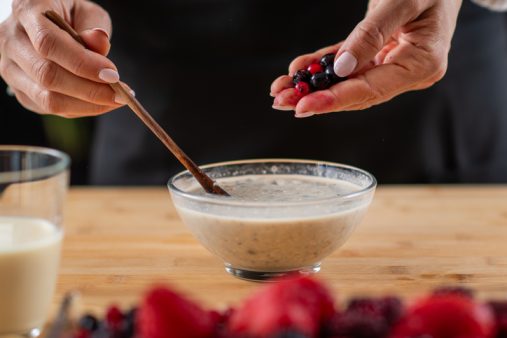 Superfood oatmeal, combining wholesome oats, creamy soy milk, and a medley of luscious berries for a vibrant and nutritious breakfast