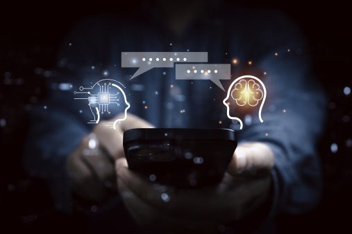 Businessman using smartphone to chatting by use chat Bot program for Artificial intelligence or AI technology concept.