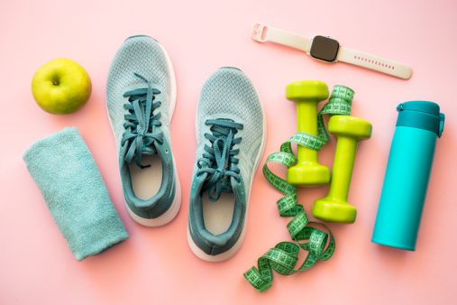 Healthy lifestyle concept. Fitness equipment and diet food.